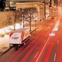 Corporate Express lorry at night