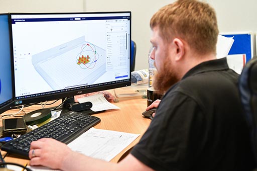young man using design software