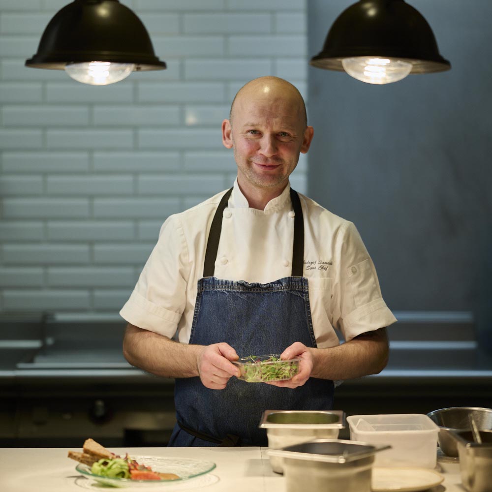 chef prepares a salad