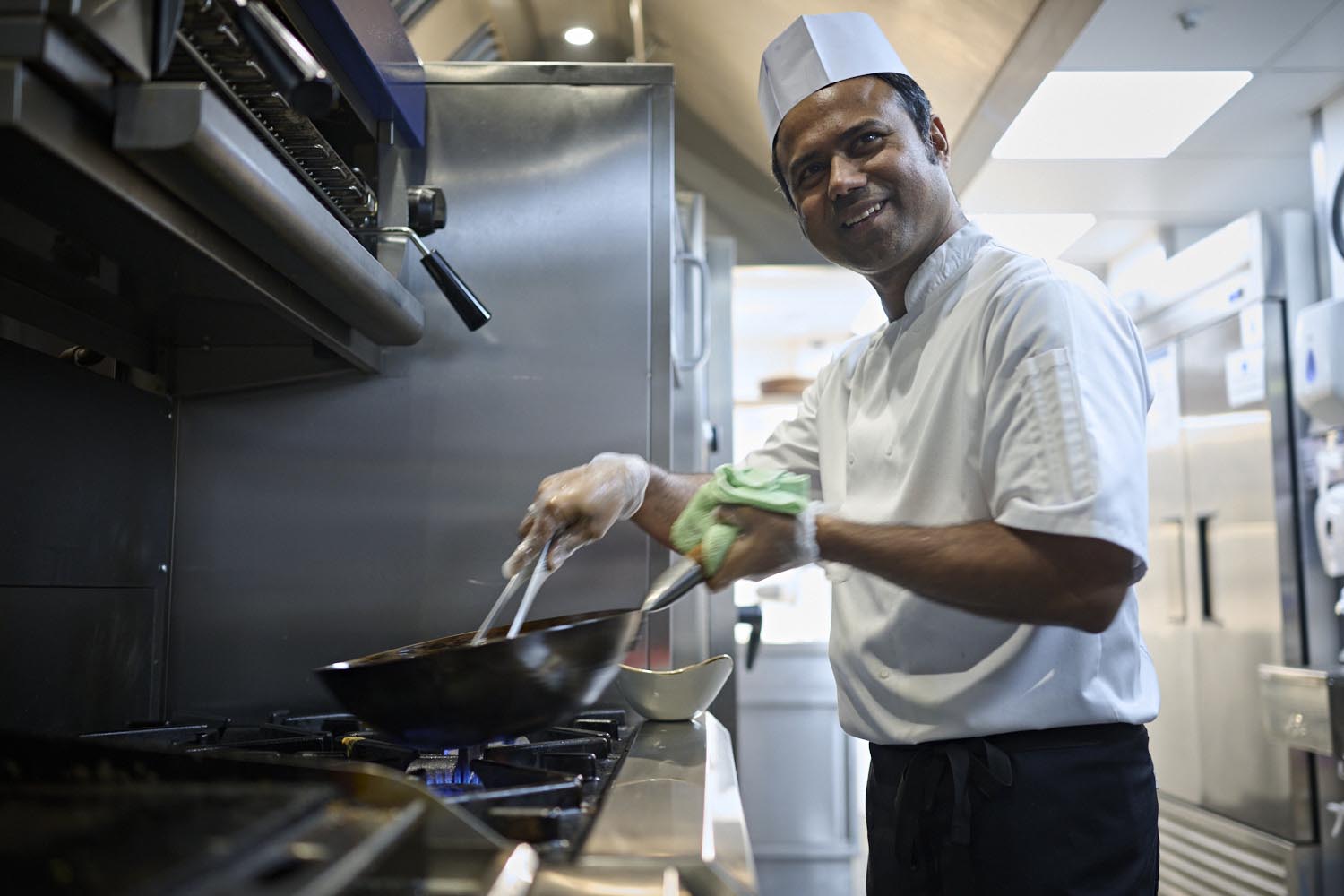chef stirring a wok